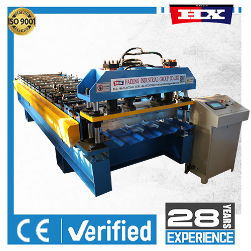 Roof panel roll forming machine